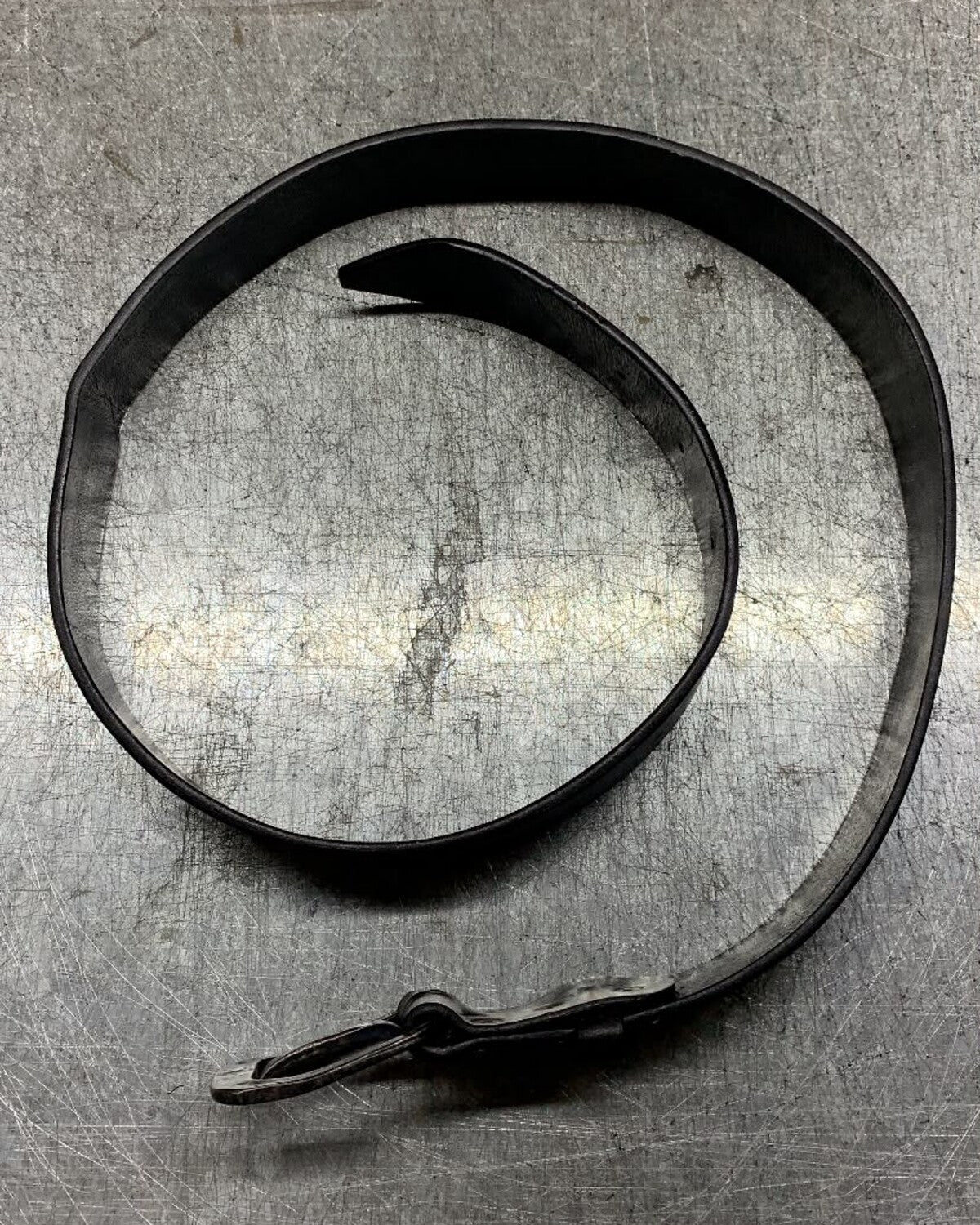 Aevum black leather belt shown at full length
