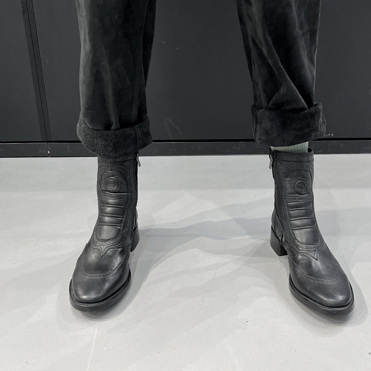 Oxford Short black leather boots worn, frontal view